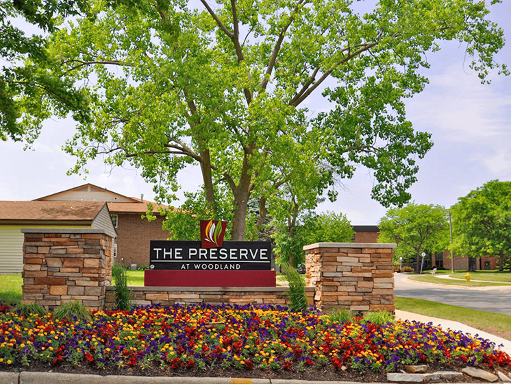 sign outside preserve at woodland apartment